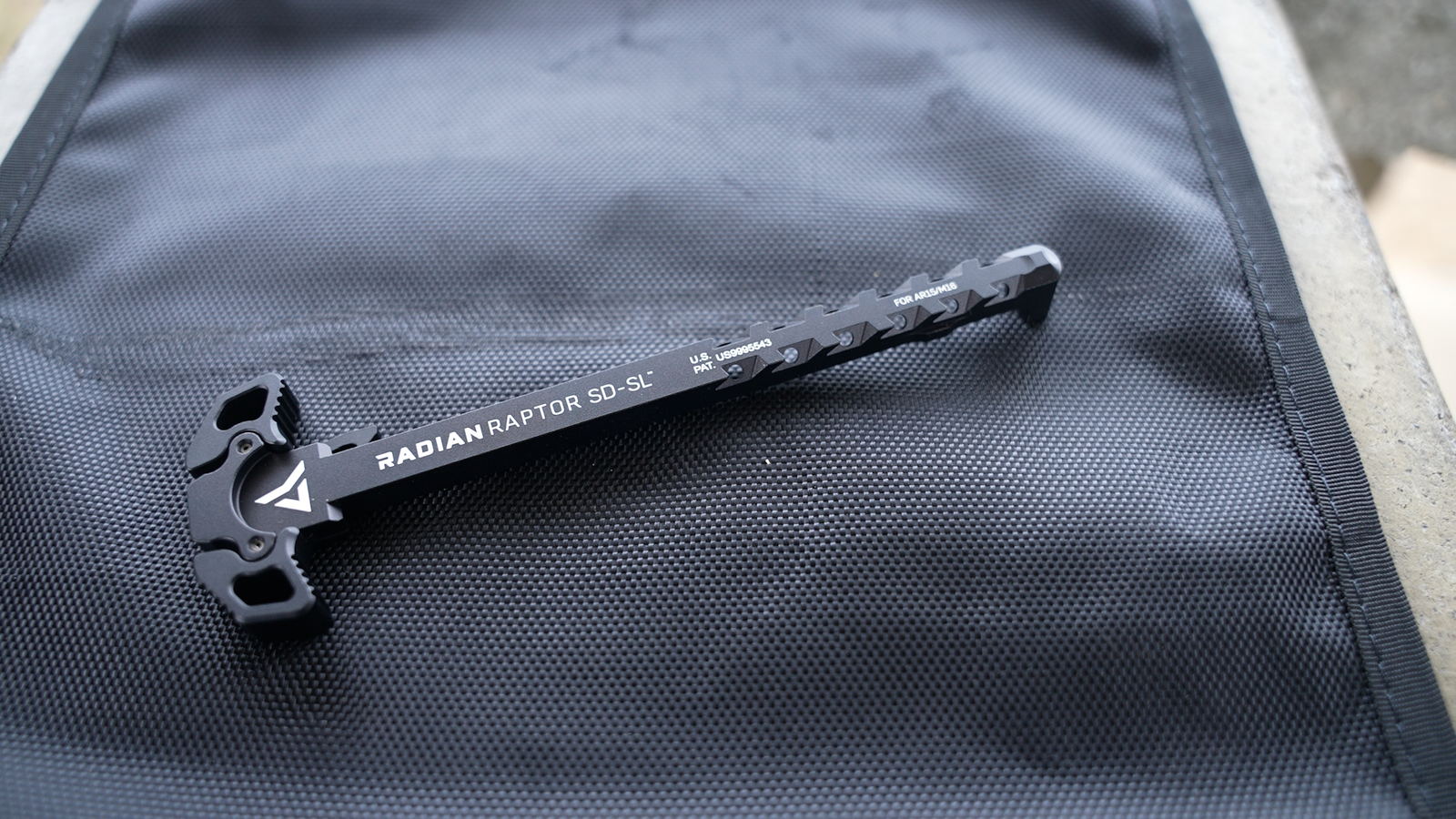Comparing AR-15 charging handle latch width and gas features