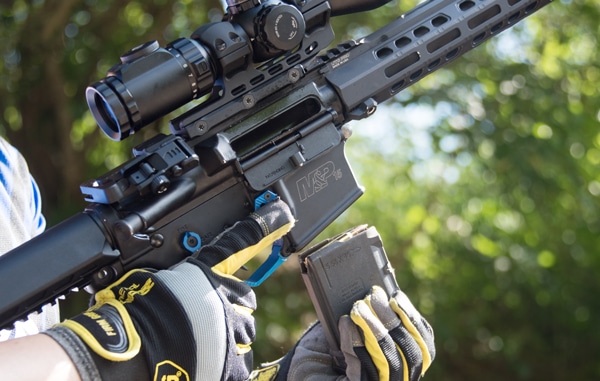 Locks in and drops from from AR-15 lowers