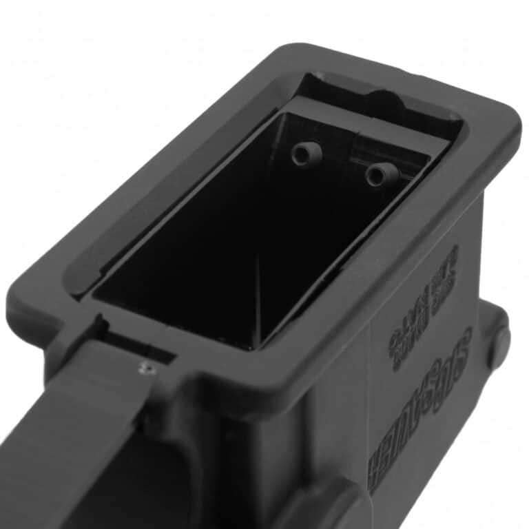 Use the provided allen wrench to install the set screws at the front of the magwell, just until they are snug against your lower receiver.